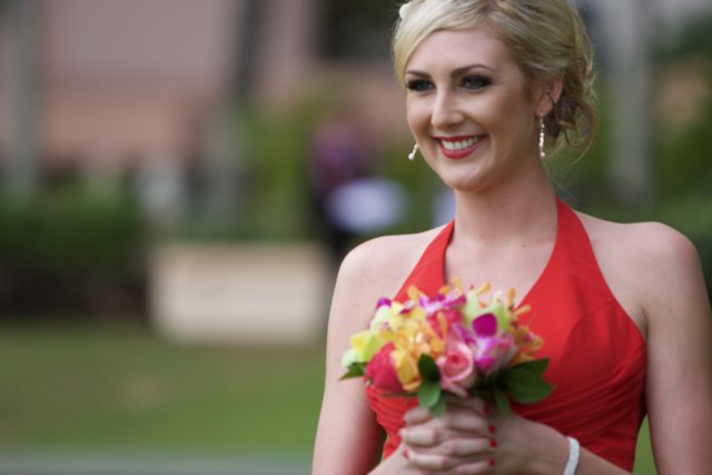 A Radiant Bride with a Vibrant Bouquet