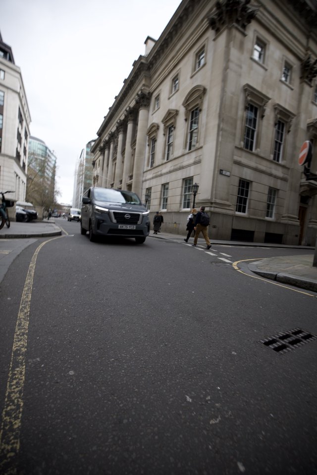 Gray Van on London Street Corner