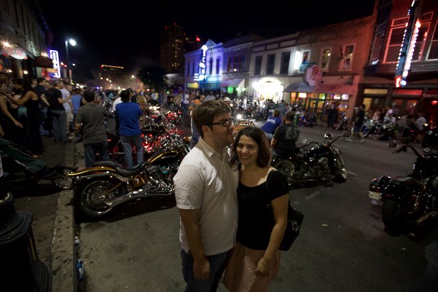 Couple Smiling at Austin Night Motorcycle Rally