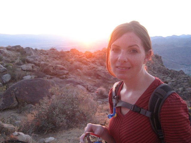 Hiker Pauses at Sunset on Desert Mountain Trail