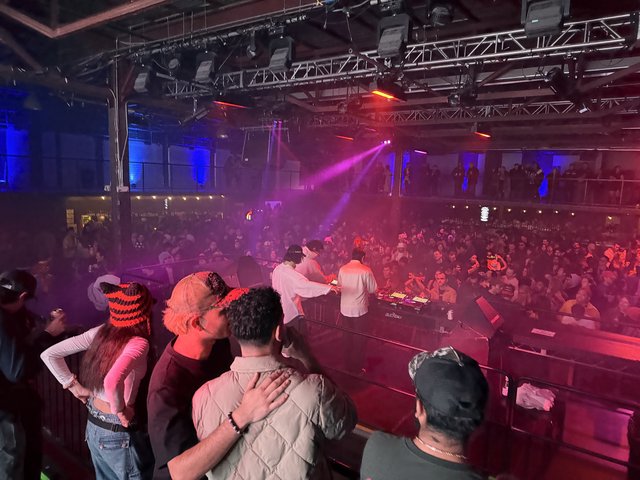 Electronic Music DJ Performance at Nightclub Venue