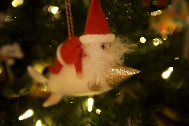 Santa Claus Ornament with Golden Ice Cream Cone