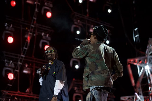 Two Men Take the Stage with Microphones at Coachella 2012