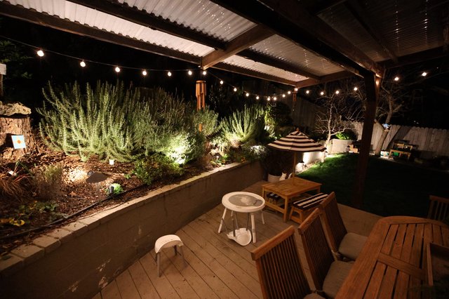 Cozy Nighttime Backyard Patio with String Lights