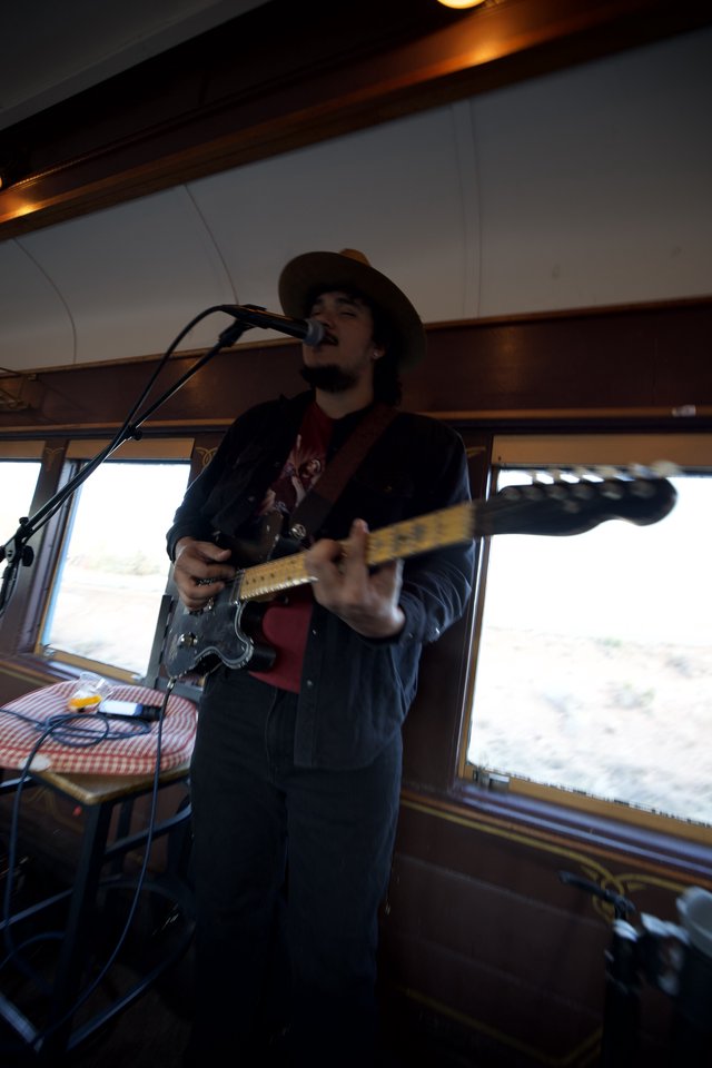 Musician Performing on Boat During Winter Cruise