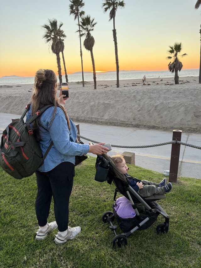 Golden Hour Beach Moment with Mom and Child