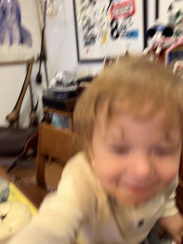 Blurred Childhood Moment in Creative Home Studio