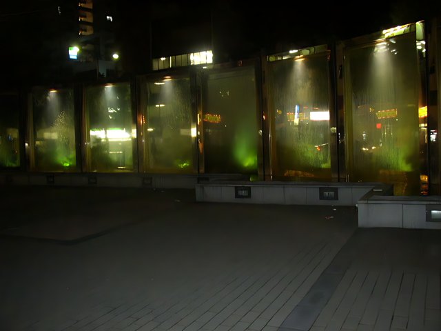 Illuminated fountain in the city