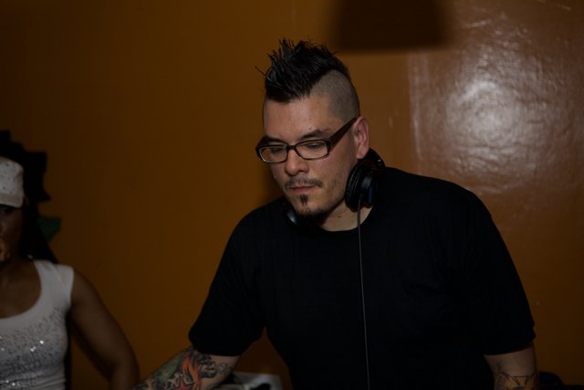 Dubstep DJ with a Mohawk and Glasses