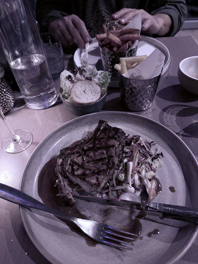 Fine Dining Experience with Grilled Steak and Shared Appetizers