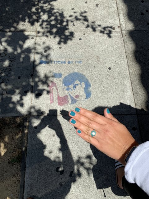 Blue Nails on the Sidewalk