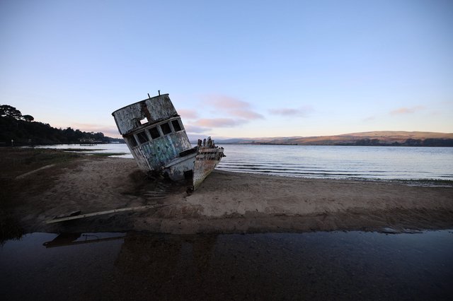 Abandoned Shipwreck on California Coast at Twilight