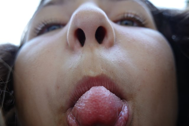 Close-up Portrait with Extended Tongue