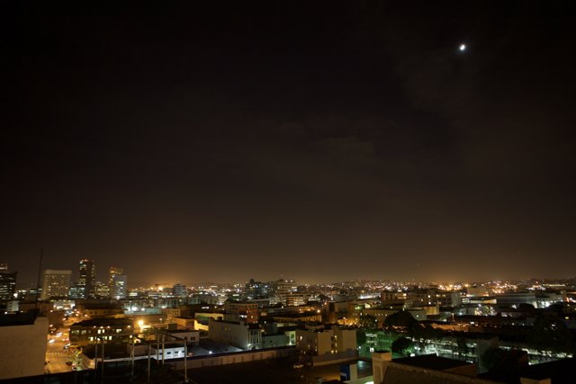 Lunar Eclipse Over the Cityscape