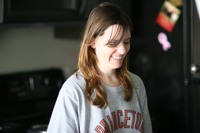 Smiling Woman in Princeton Sweatshirt at Home