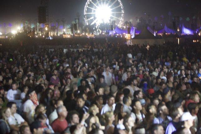 Ferris Wheel over festival crowd