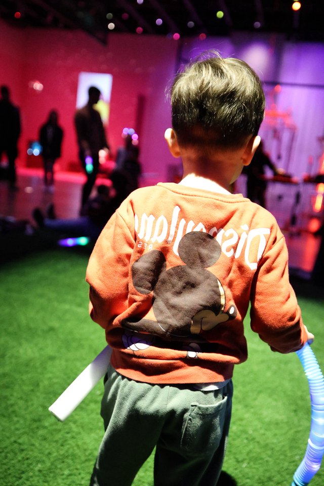 Child at Baby Rave Event in Museum