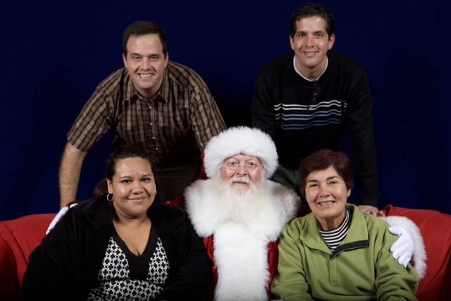 A Family's Festive Photo with Santa