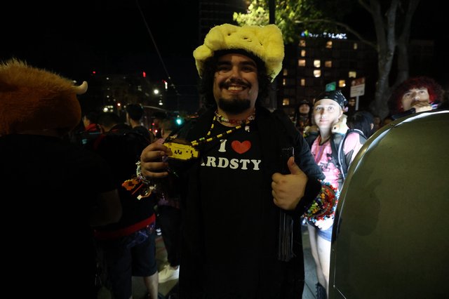 Enthusiastic Fan Celebrates at Wobbleland Festival Night