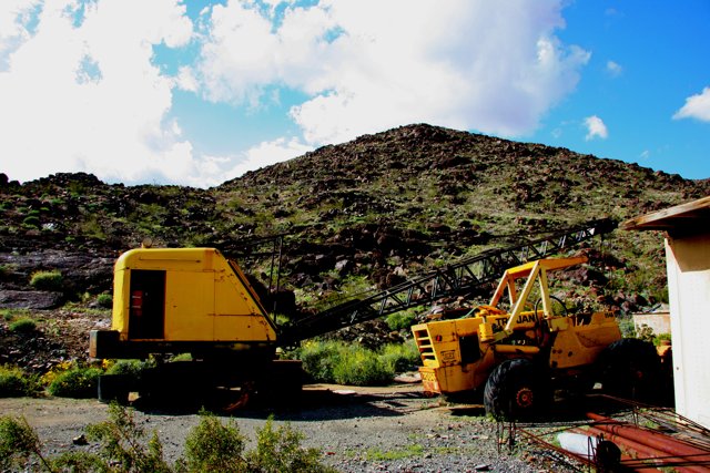 Yellow Bulldozer at the Mountain Range
