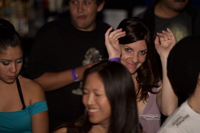 Friends Dancing Together at a Nightclub Party