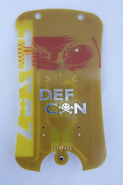 2008 Defcon Badge with Yellow and Red Electronic Device