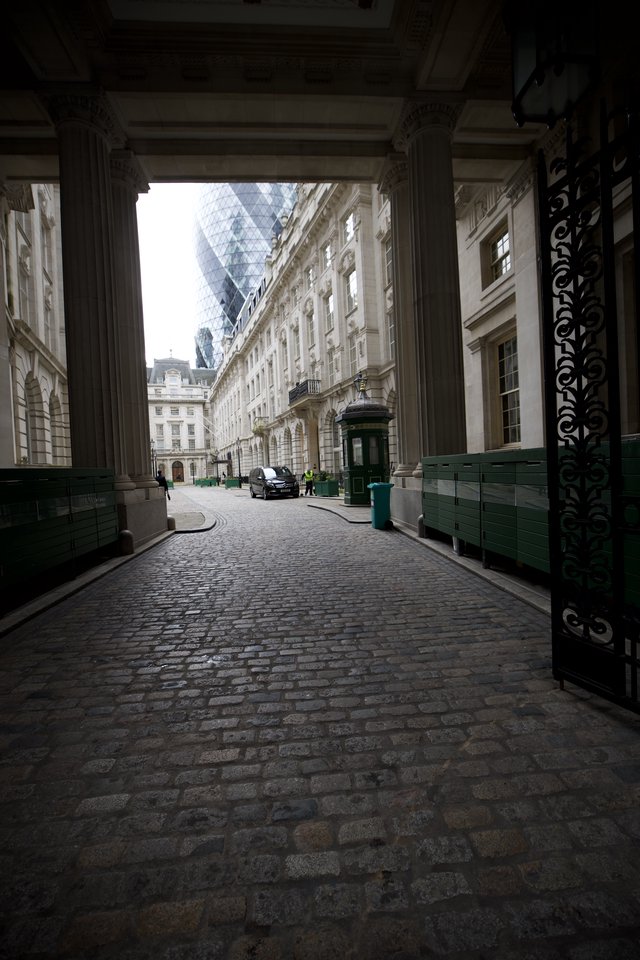 Gateway to London's Financial District Through Classical Archway