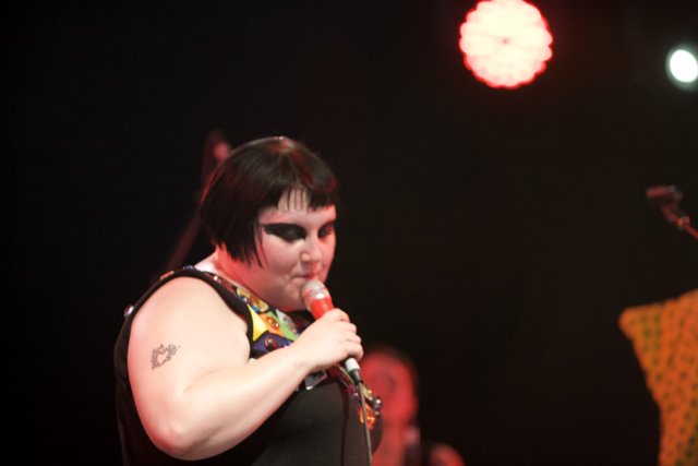 Tattooed Performer Belts It Out