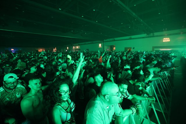 Massive Crowd Surges Under Green Lights at Wobbleland