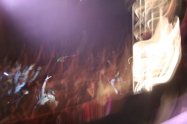 Blurred Presence in a New Year's Eve Concert Crowd