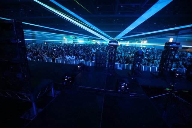 Massive Crowd Electrified by Laser Light Show