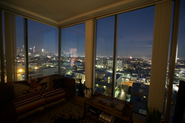 Cityscapes and Sky Views from a Penthouse Living Room