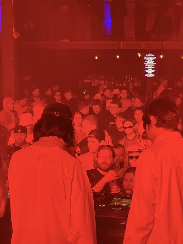 DJ Set in Red Lit Underground Club Atmosphere