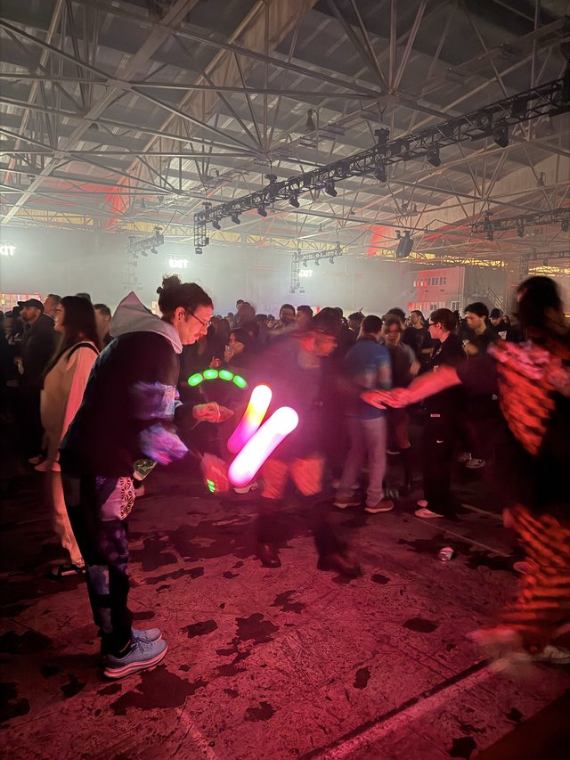 Electronic Dance Music Event with Glowing LED Accessories