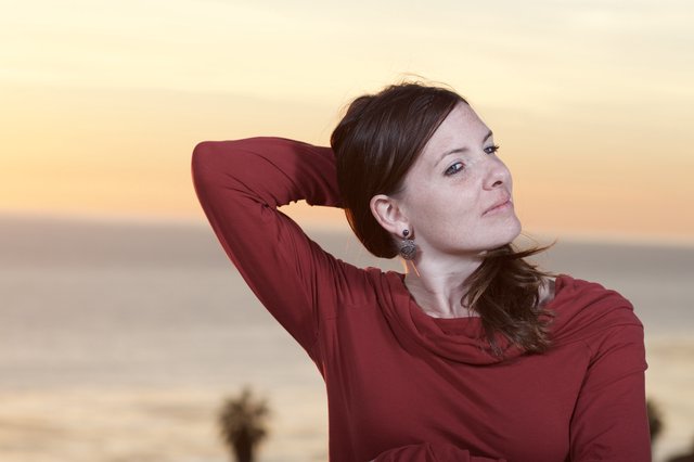 Woman in Red at Golden Hour Seaside