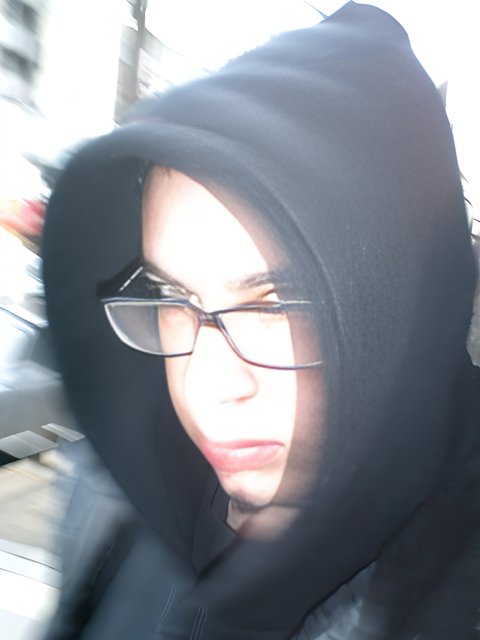 Blurry Portrait of Woman in Black Hoodie