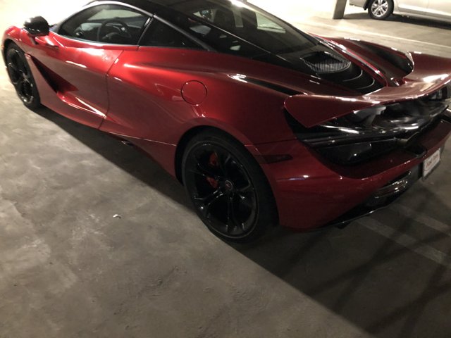 Parked Red McLaren 720s in Garage
