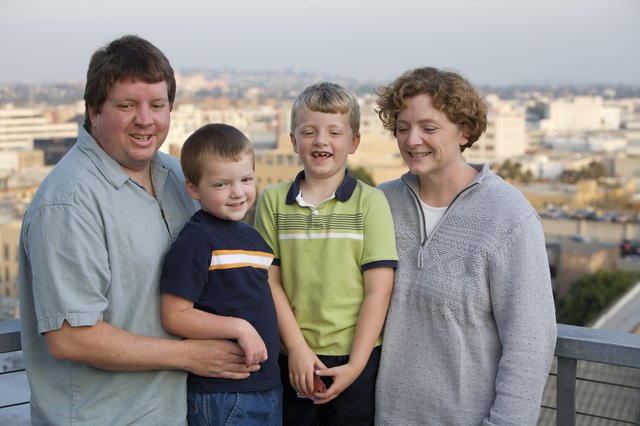 Family Portrait on Urban Rooftop at Dusk