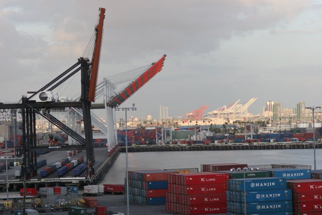 Busy Port Scene with Large Crane