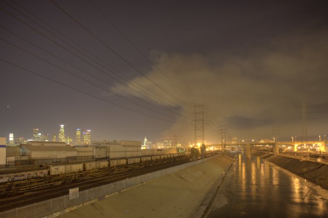 Night City Skyline Engulfed in Smoke