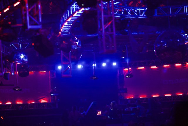 Red and Blue Lights Illuminate Stage and Crowd