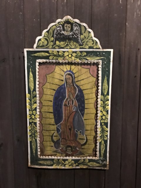 The Virgin of Guadalupe in a Painted Frame