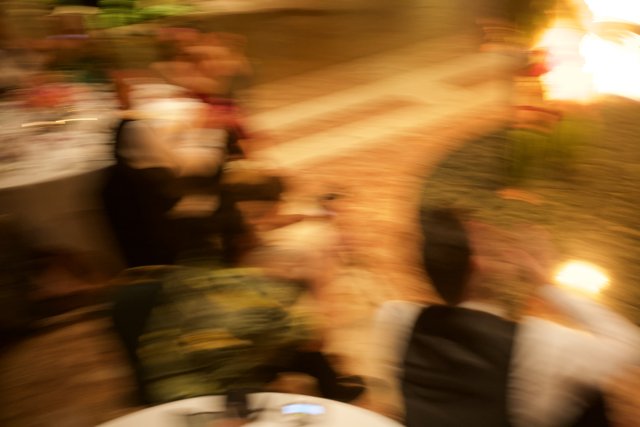Blurred Flames at Wedding Reception