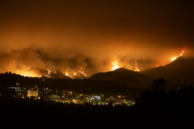 Devastating Station Fire Burning through Mountains and Cityscape