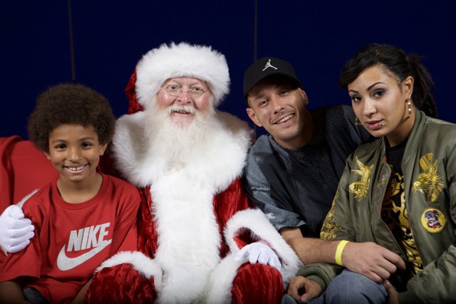 A Merry Christmas Party with Santa, Children, and a Man