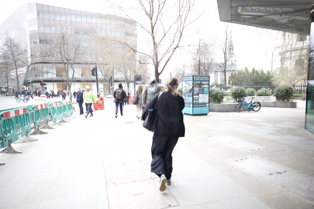 Morning Commute Through London's Modern Urban Plaza