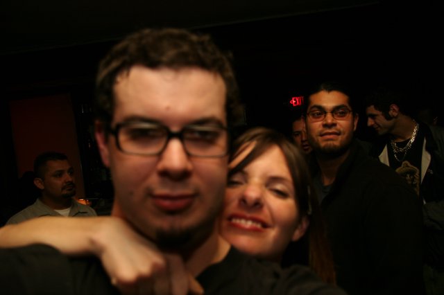 Friends Crowd a Dimly Lit Nightclub in 2005