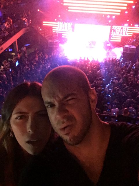 Capturing the Moment: Dave B and Lori S Take a Selfie at a Concert