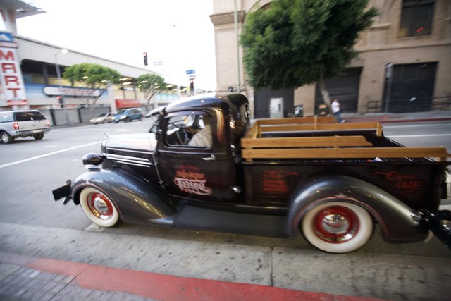 Vintage Pickup Truck Cruising Down the Street