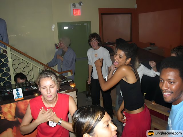 Night Club Partygoers Gather Around the Dance Floor